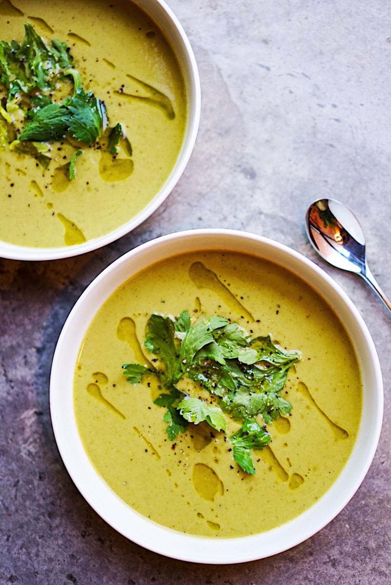 Photo by Megan Bucknall green soup on white ceramic bowl