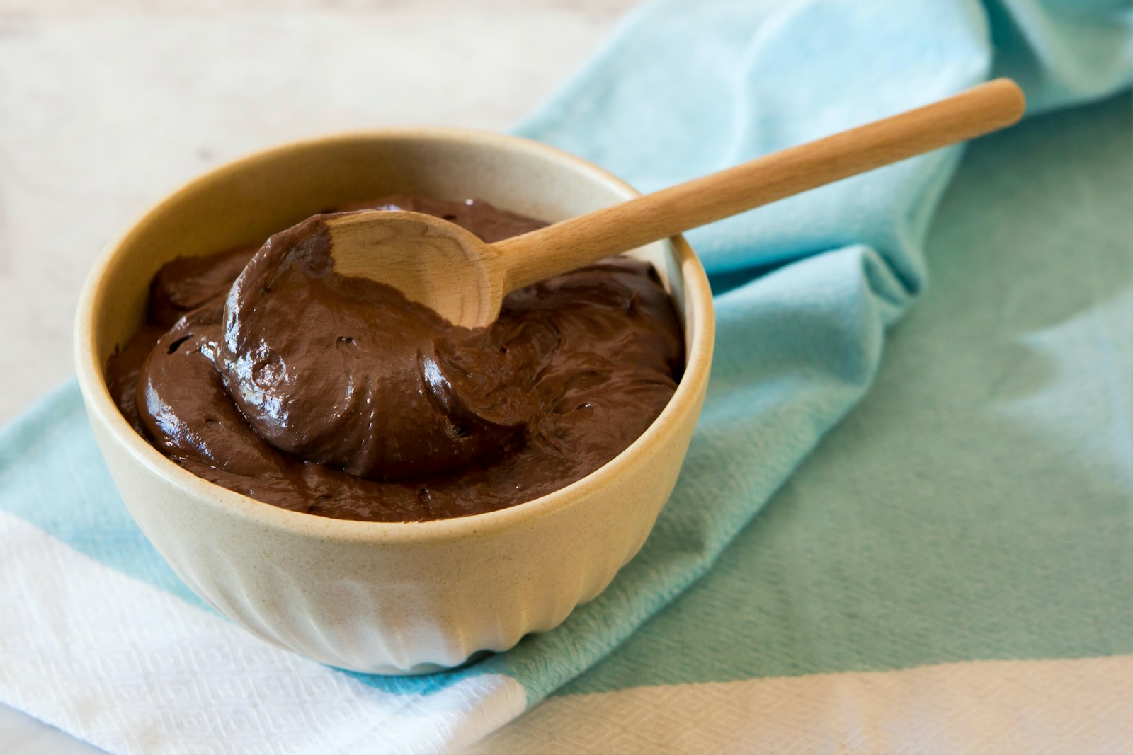 Photo by American Heritage Chocolate brown chocolate on white ceramic bowl